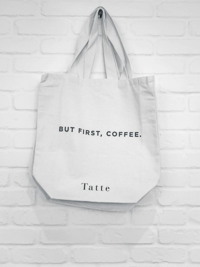 White canvas tote bag on a wall